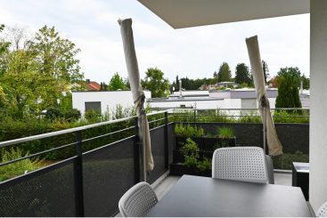 Moderne 4-Zimmer-Wohnung mit umlaufendem Balkon in Unterhaching