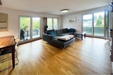 Moderne 4-Zimmer-Wohnung mit umlaufendem Balkon in Unterhaching